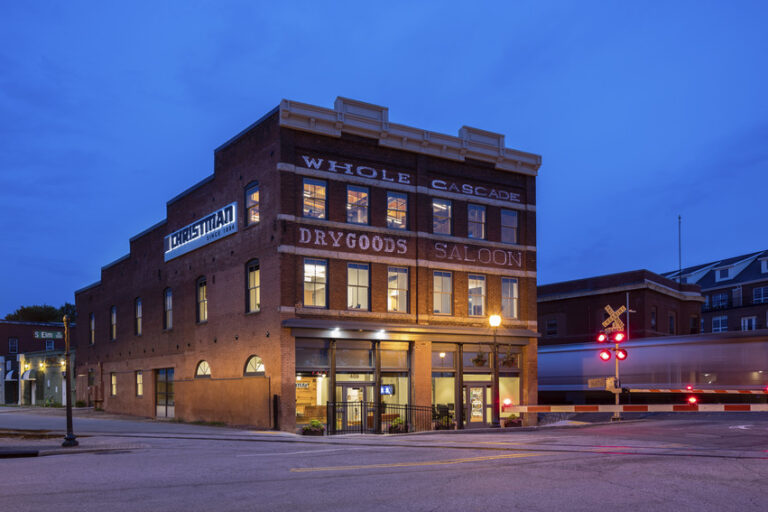 Front entrance of Cascade Saloon, nestled between two active train tracks